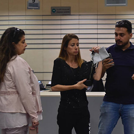 Lübnanda parasını çekemeyen milletvekili banka şubesini bastı