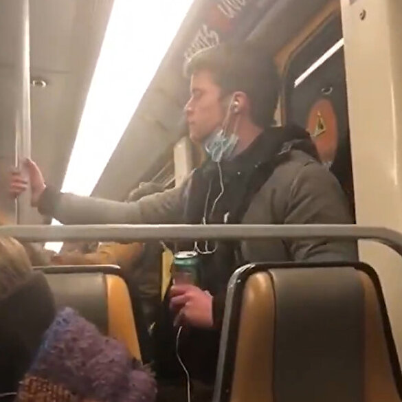 Belçika'da koronavirüslü olduğu iddia edilen bir genç elini ağzına götürüp metro direğine sürdü
