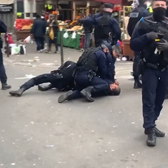 Fransız polisi sokağa çıkma yasağına uymayanları yerlerde sürükledi