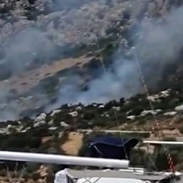Muğla Marmaris'te makilik alanda çıkan yangın söndürüldü