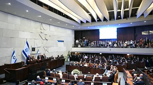 Le président américain Donald Trump s'adresse au Parlement israélien, la Knesset, à Jérusalem, le 13 octobre 2025.