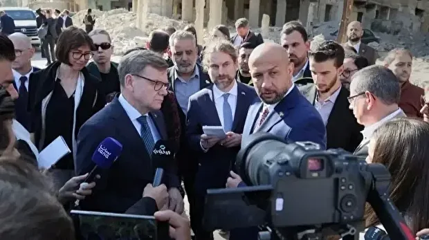 وزير خارجية الدنمارك يطلع على الدمار بحي تشرين في دمشق