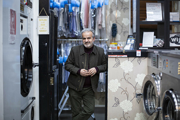Portraits of migrant shopkeepers living in London