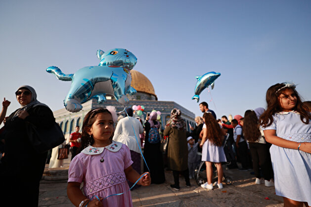 Palestinians celebrate Eid al-Adha at Masjid al-Aqsa in Jerusalem