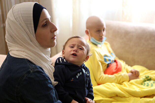 Palestinian boy refuses chemotherapy after Israeli troops arrest his father