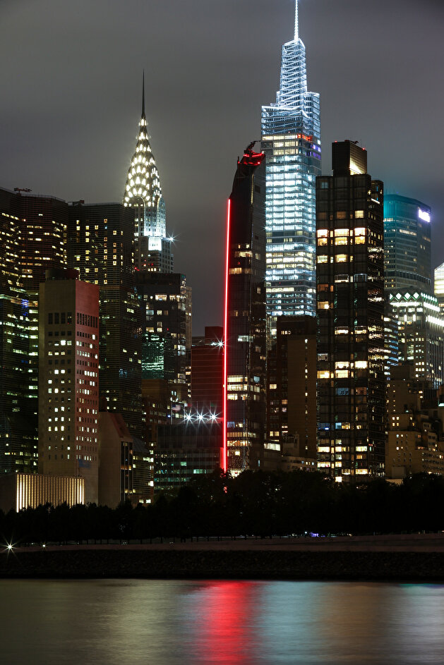 Turkish House glitters in darkness on New York City skyline