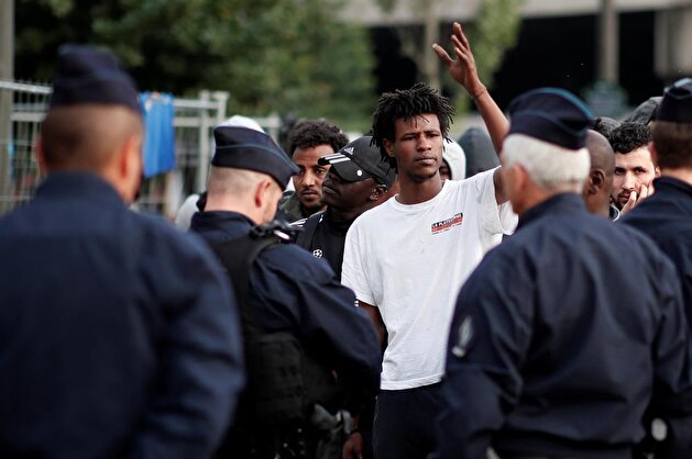 French police clear out Paris migrants camp