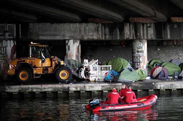 French police clear out Paris migrants camp