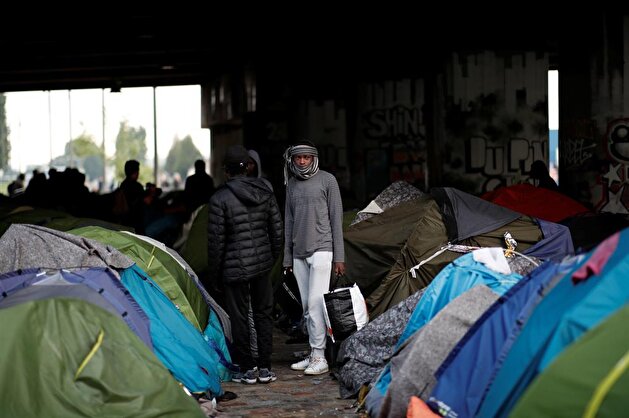 French police clear out Paris migrants camp