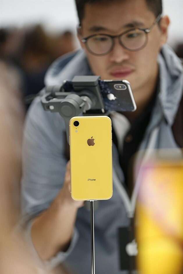 Apple unveils three new iPhones, smartwatch