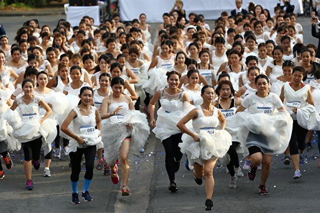 Brides-to-be participate in Bangkok's 'Running of the Brides'
