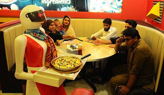 Robot waitress serves customers at Multan pizzeria
