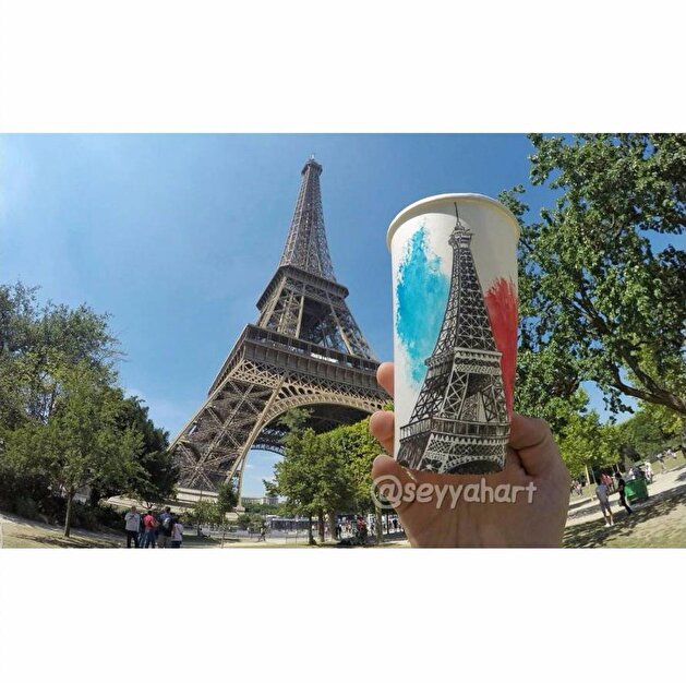 Wanderer draws his travels on coffee cups