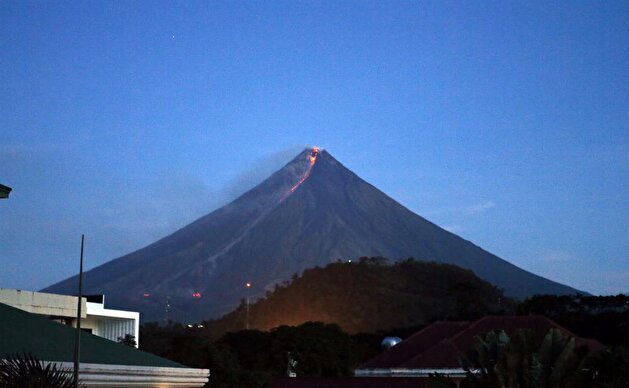 Over 70,000 evacuated after ash and lava spills from Mayon Volcano