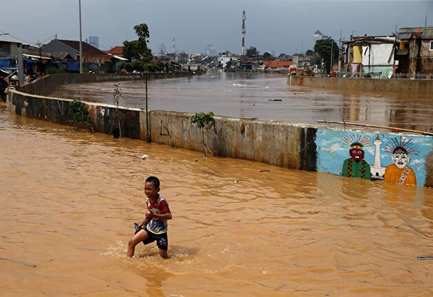 Jakarta embraces flood after heavy rain