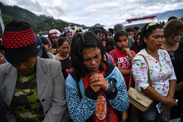 Relatives of missing passengers of the sank ferry in Lake Toba