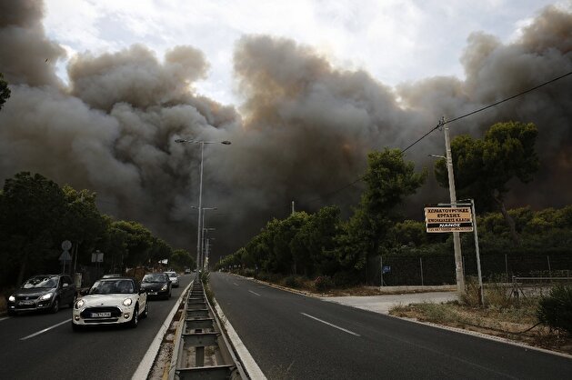 Wildfires ravage Greece’s coastal town of Mati
