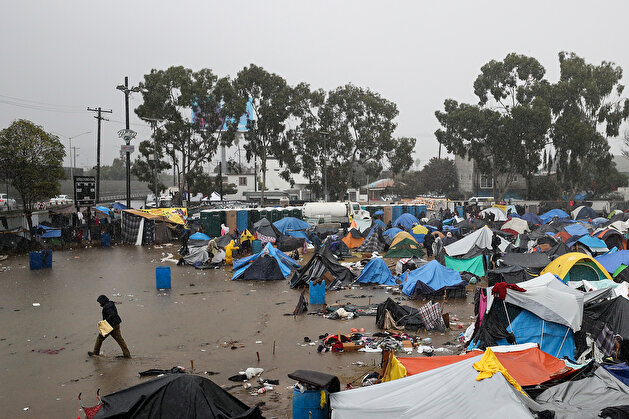 Torrential downpour devastates migrants waiting in Tijuana