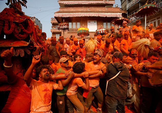 Devotees celebrate 'Sindoor Jatra' vermillion powder festival at Thimi