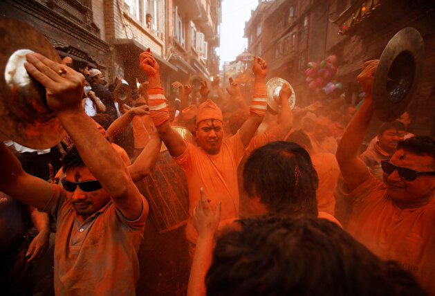Devotees celebrate 'Sindoor Jatra' vermillion powder festival at Thimi