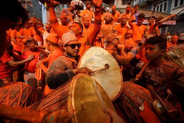 Devotees celebrate 'Sindoor Jatra' vermillion powder festival at Thimi