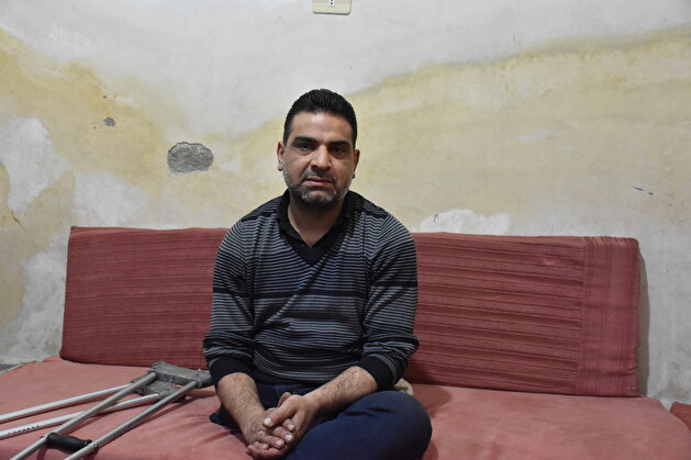 Syrian father holds on to life despite losing leg