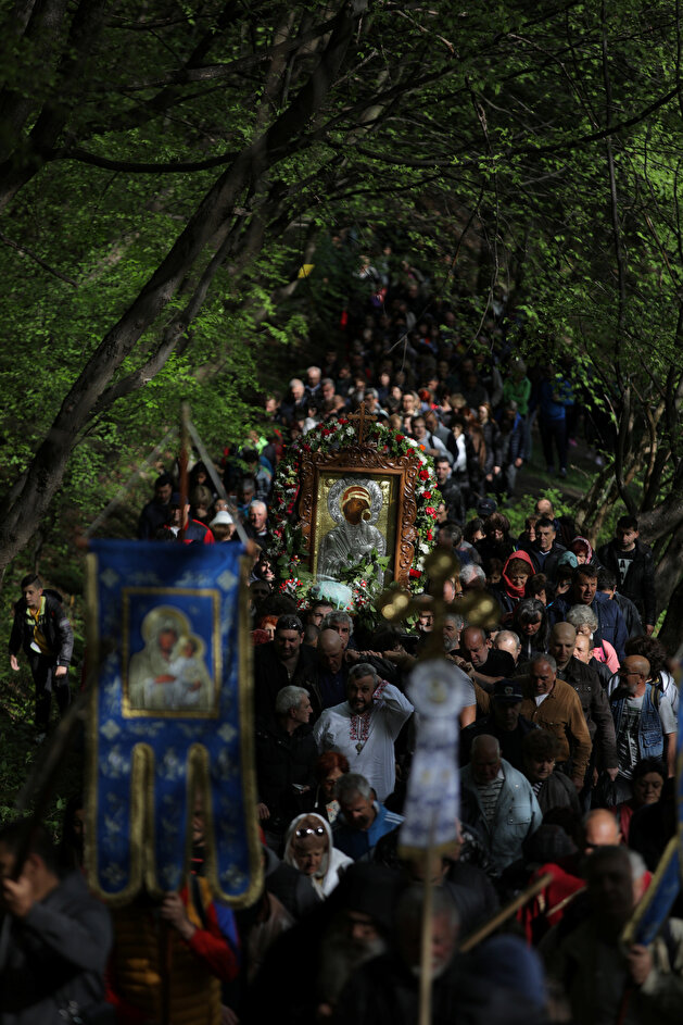 Orthodox Christians carry an icon of the Virgin Mary during a parade marking Easter near Bachkovo monastery