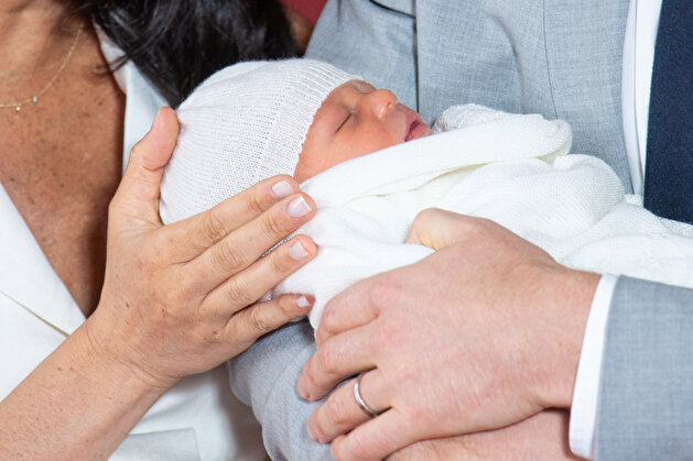 Britain's Prince Harry and Meghan, Duchess of Sussex are seen with their baby son at Windsor Castle