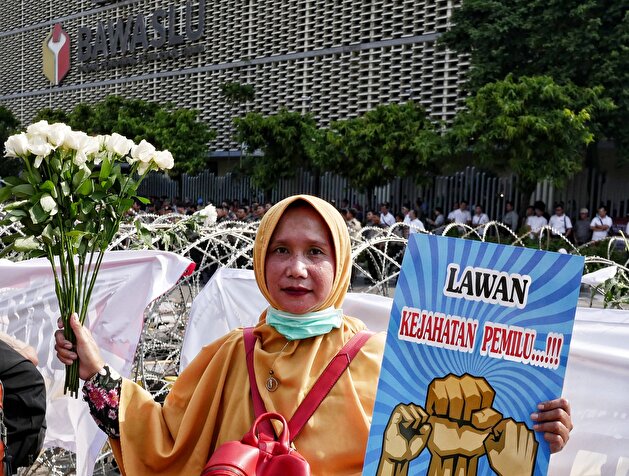 Mass rally in The Elections Supervisory Agency in Jakarta
