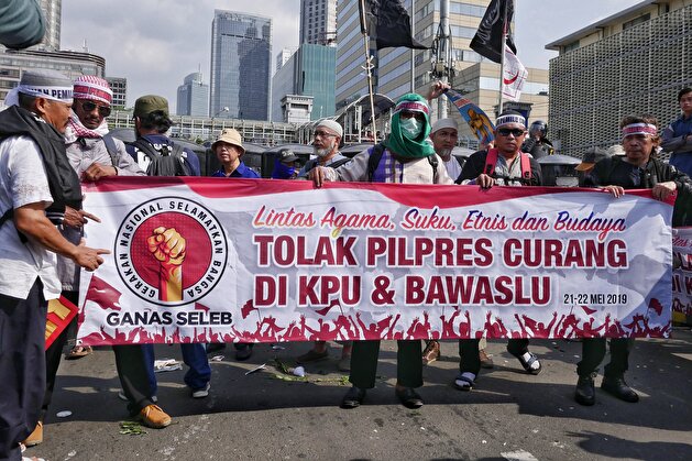 Mass rally in The Elections Supervisory Agency in Jakarta