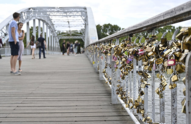 Love locks on the Debilly Passerelle over the Seine River in Paris
