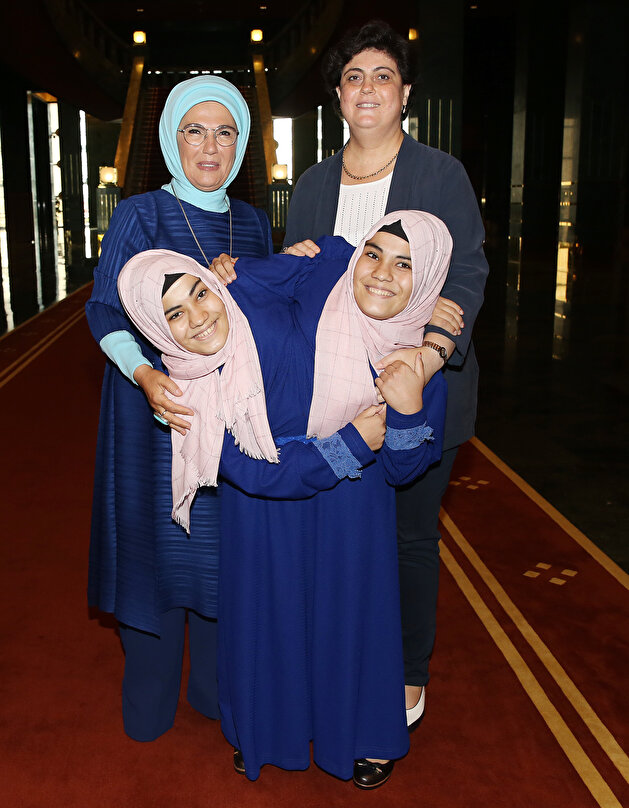 President Erdoğan welcomes siamese twin in Turkey