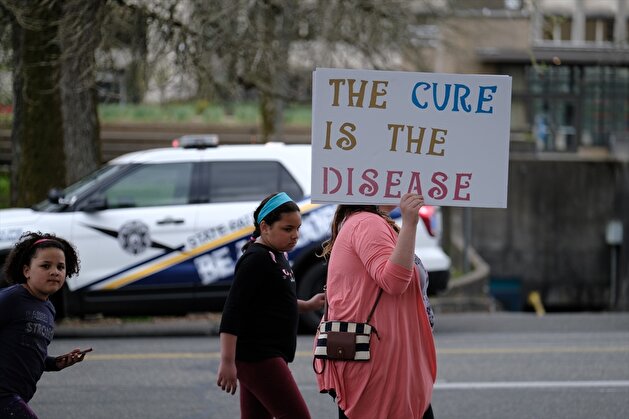 People demonstrate outside Washington State Capitol