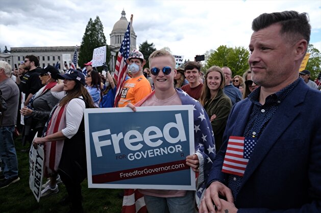 People demonstrate outside Washington State Capitol