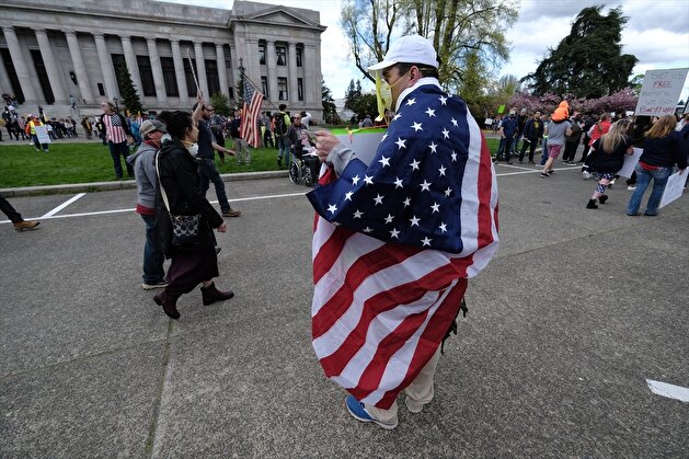 People demonstrate outside Washington State Capitol