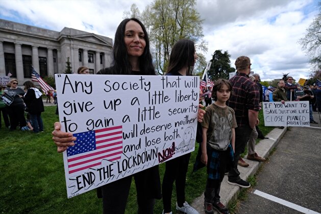 People demonstrate outside Washington State Capitol
