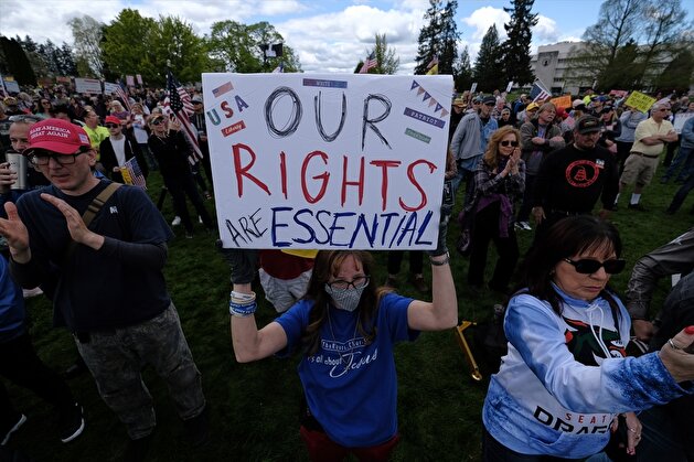 People demonstrate outside Washington State Capitol