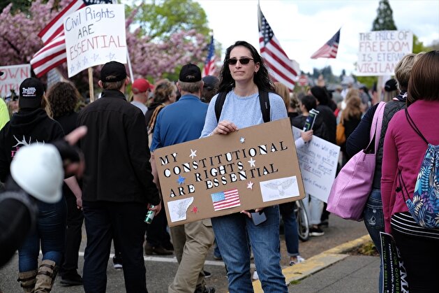 People demonstrate outside Washington State Capitol