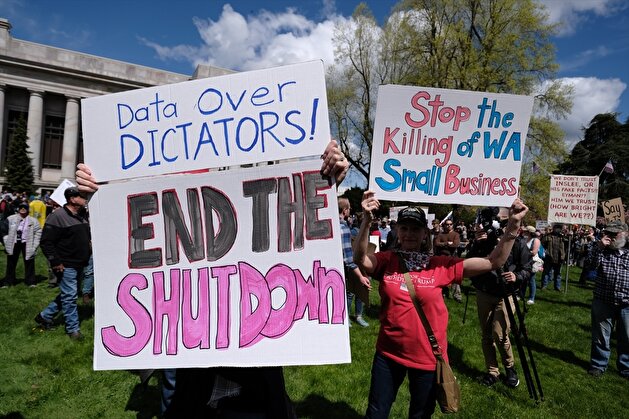 People demonstrate outside Washington State Capitol