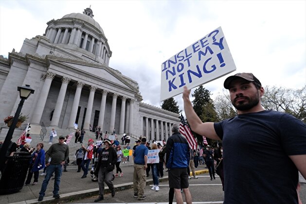 People demonstrate outside Washington State Capitol
