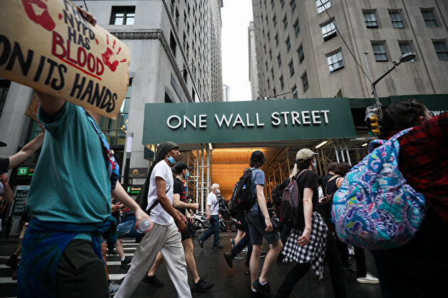 'Black Lives Matter' protestors spill red paint on streets in Financial District in NYC