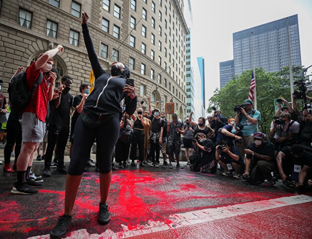 'Black Lives Matter' protestors spill red paint on streets in Financial District in NYC