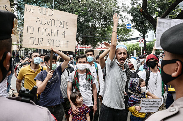 Refugees protest outside UNHCR office during coronavirus outbreak
