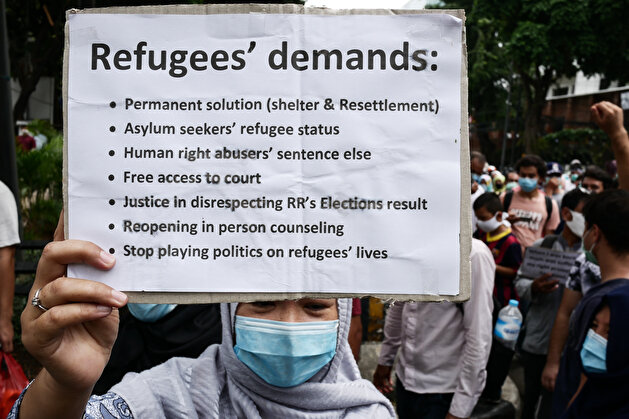 Refugees protest outside UNHCR office during coronavirus outbreak