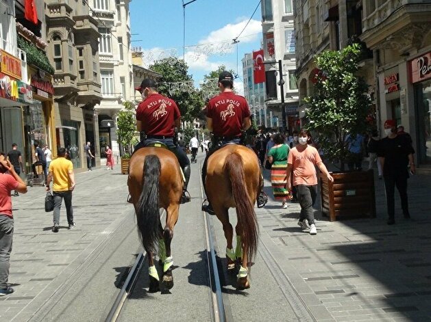 Turkish policemen patrol iconic Taksim square on horseback