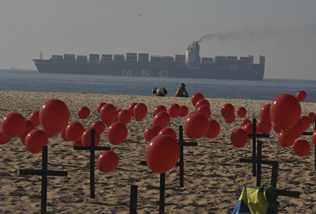 Red balloons released at Copacabana beach as a tribute to the 100,000 Brazilians killed due to Covid-19