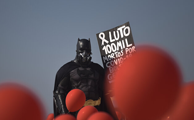 Red balloons released at Copacabana beach as a tribute to the 100,000 Brazilians killed due to Covid-19