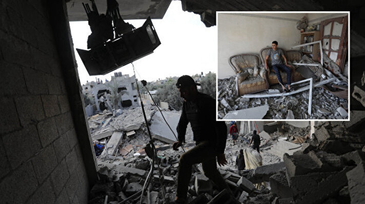 <p>&nbsp;Filistinliler, binanın enkazında kullanılabilir durumdaki eşyaları topladı.</p>
