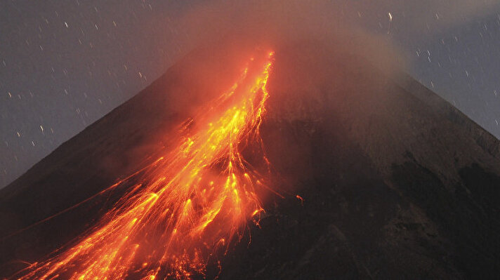 <p>Mount Merapi is seen as it spews lava in Yogyakarta, Indonesia. The active volcano, which has an Alert status (level III), has experienced 22 incandescent lava avalanches and gases of carbon dioxide, sulfur, acid, and volcanic ash with a maximum sliding distance of 2,000 meters to&nbsp;the&nbsp;southwest.</p>