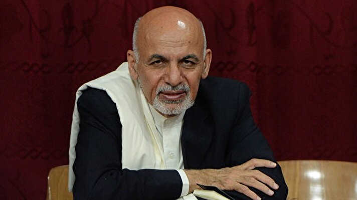 Afghan President Ashraf Ghani looks on as he listens to teachers during his visit to the Amani High School in Kabul September 30, 2014. REUTERS/Wakil Kohsar/Pool (AFGHANISTAN - Tags: POLITICS EDUCATION)